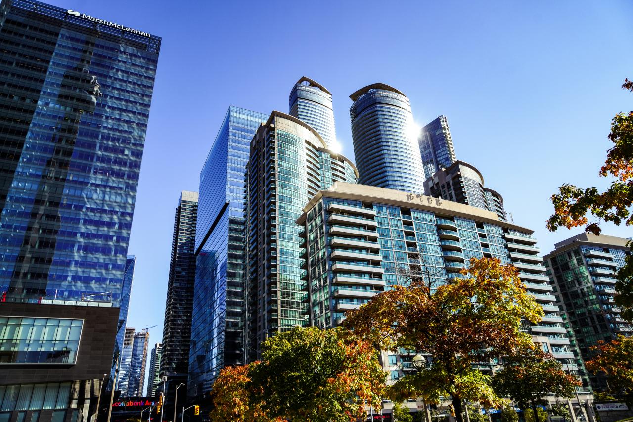a group of tall buildings sitting next to each other