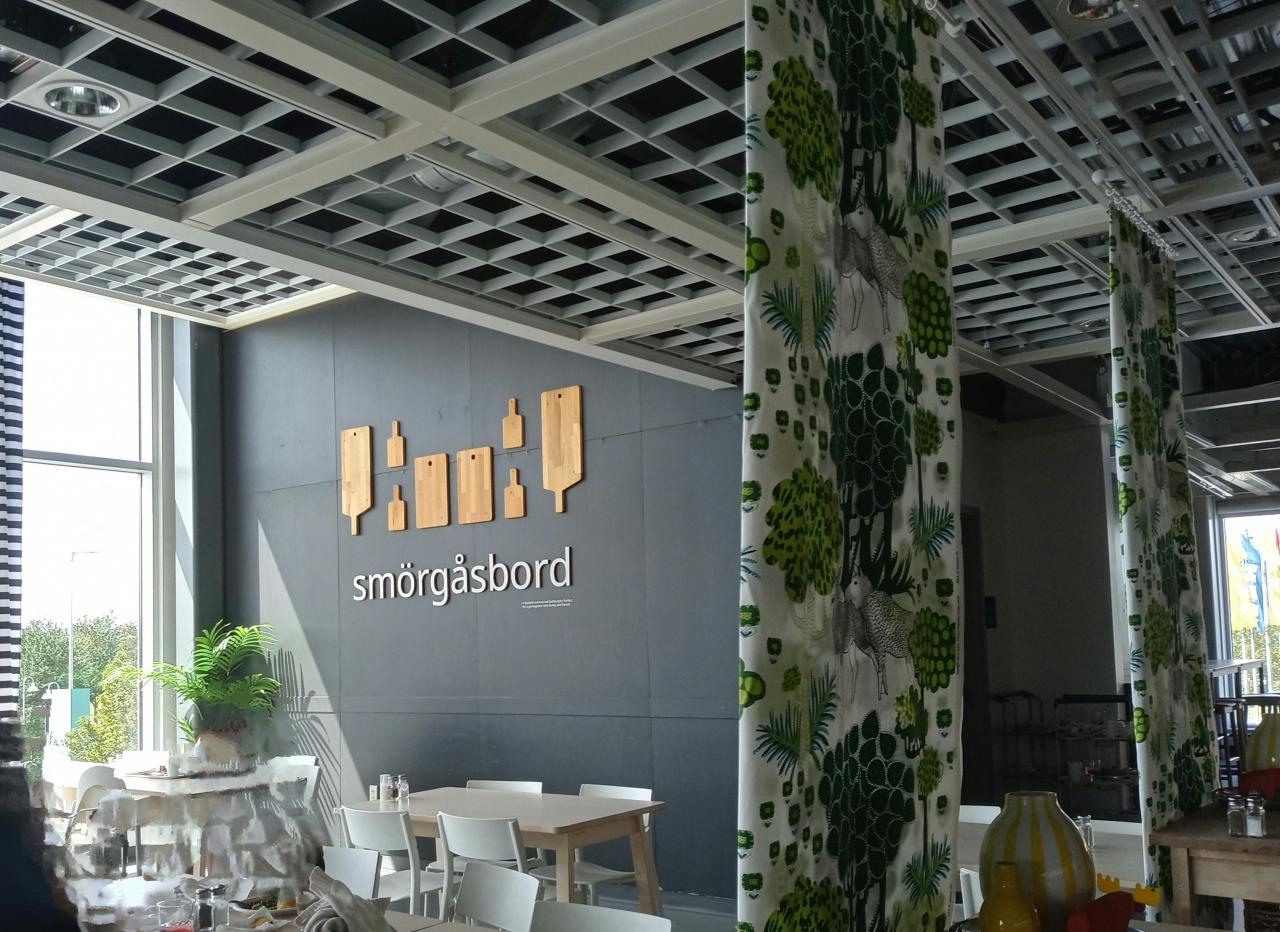 A restaurant area with modern interior design is shown.