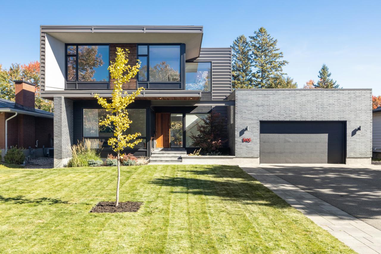 a house with a tree in the front yard